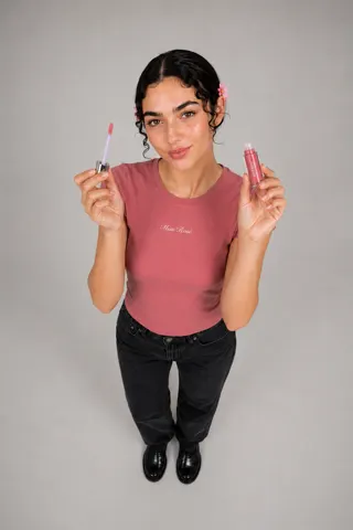 Full-length lip gloss shoot, shot from above