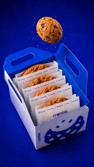 Cookie box with cookies on blue
